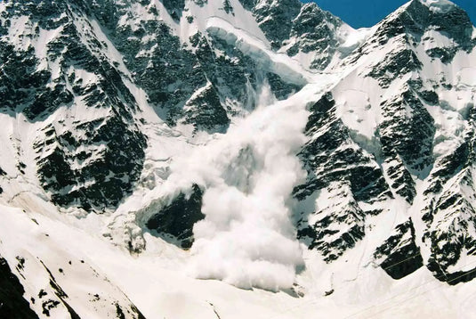 Breathtaking snowy peaks against the sky, capturing the beauty of nature's winter majesty