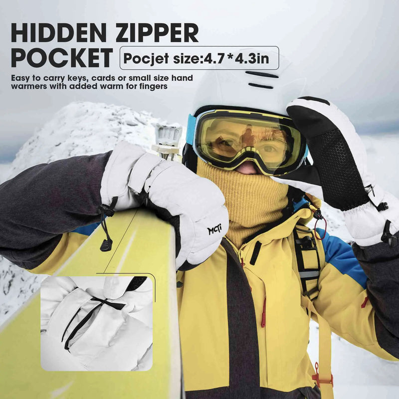 Load image into Gallery viewer, Woman holding a snowboard on a snowy mountain, showcasing the convenience of the hidden zippered pocket design on the back of the white Quilted Style Mittens for carrying ski cards, keys, and small-sized hand warmers.
